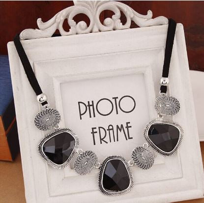 Noir Spiral – Black Stone & Antique Silver Statement Necklace